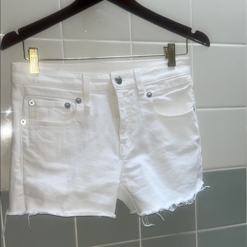 Mid Rise “boy skinny” white denim shorts